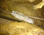 Abestos based material in a roof space